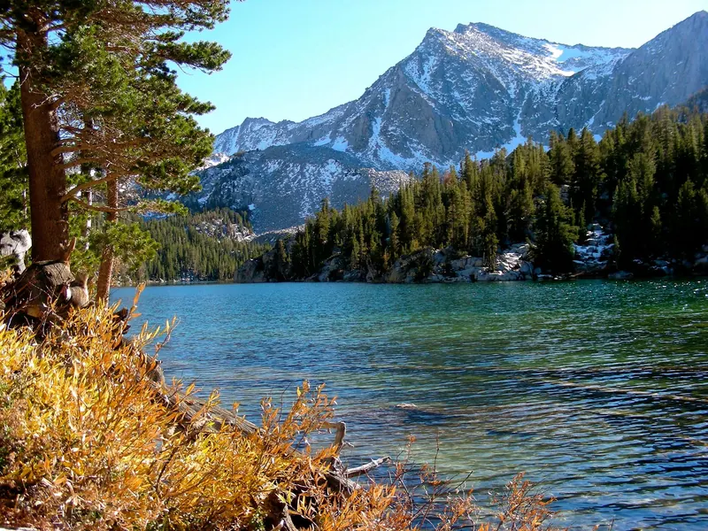 An alpine lake below snow-streaked peaks near June Lake