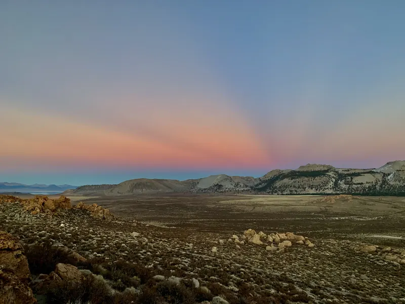 Sunset rays fanning over the Mono Craters and the Mono Basin